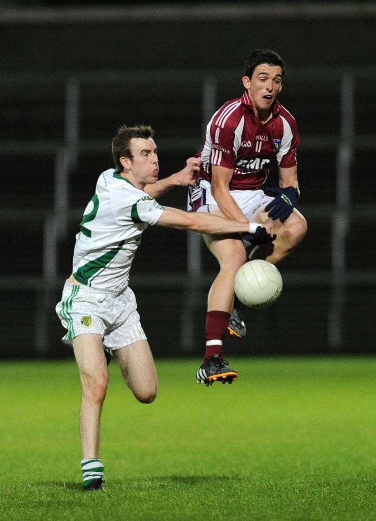 Ballymacnab's Rory Grugan in action with Granemore's Finbar Conroy in close attendance
