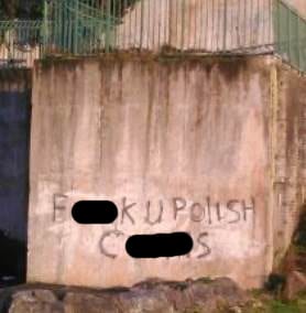 Racist graffiti scrawled across a wall in Newry