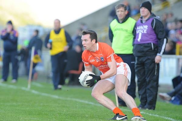 Tony Kernan in possession for Armagh. Photo by John Merry