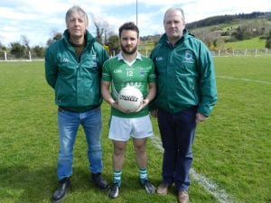 Kieran Malone (Malone Monumental), who sponsored our senior game on Sunday, presents the match ball to senior team captain Micheál Brady. Also pictured is Shane O'Neill's vice-chair, Mickey Mackin.