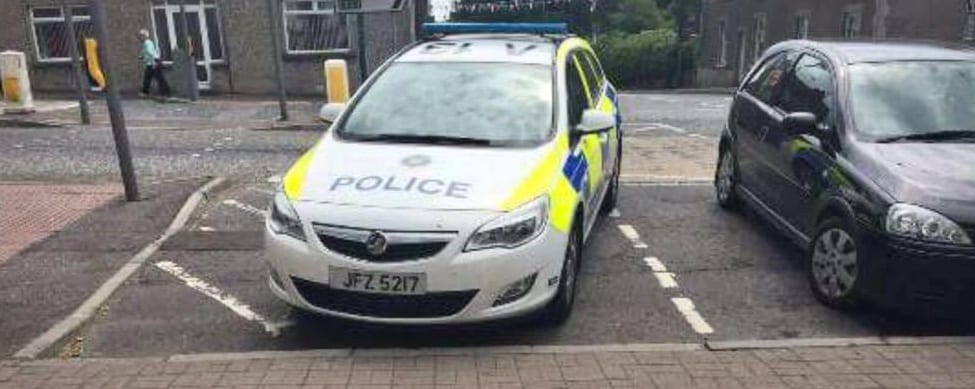 Police parked in a disabled parking spot without a blue badge displayed. Photo taken in Richhill Pic: M. Cloughley