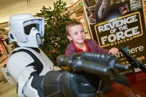 Pictured with a stormtrooper is 7 year old Lennon Dornan from Craigavon on a speeder bike ahead of the Revenge of the Force exhibation at Rushmere Shopping Centre this weekend