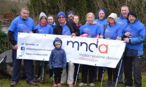 Stephen Thomson of MNDA (centre) pictured with some of the' Four Peaks Challenge' climbers