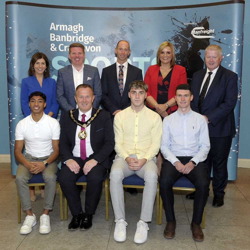 Front row (l to r) Clepson Dos Santos, Lord Mayor Councillor Paul Greenfield, Jake Tucker and Matthew Teggart. Back row (l to r) Council Deputy Chief Executive Charlene Stoops, Nick McCullough from Manfreight Limited, Jonathan Hayes, Denise Watson and Chair of Armagh, Banbridge and Craigavon Sports Forum Cathal O’Neill