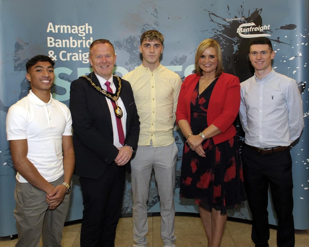 Commonwealth Games athletes Matthew Teggart, Jake Tucker, Clepson Dos Santos are pictured with Lord Mayor Councillor Paul Greenfield and Denise Watson.