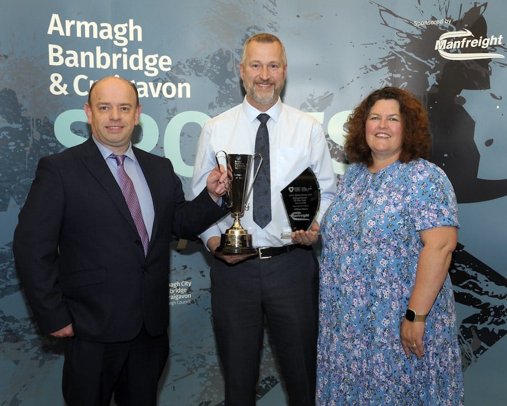 William Moore from Royal School, Armagh wins the School Coach Award sponsored by Sport NI. Richard Bullick from Sport NI and Councillor Louise McKinstry, Chair of Council’s Leisure and Community Services, present the award.