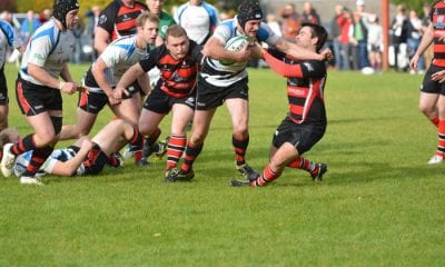 James Morton forces his way through the Rainey defence