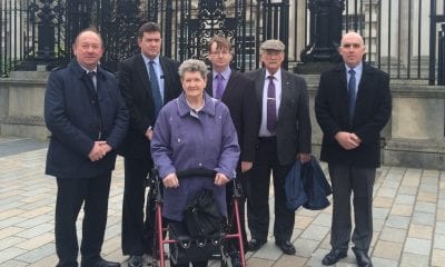 Beatrice Worton with campaigners, including DUP's William Irwin