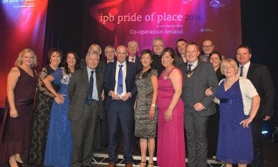 Pictured at the Pride of Place Awards ceremony are representatives from Keady Community, Cultural and Festival Group, Co Armagh along with Dr Christopher Moran, Chairman Co-operation Ireland and Tom Dowling, Chairman of the Pride of Place Committee
