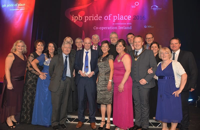 Pictured at the Pride of Place Awards ceremony are representatives from Keady Community, Cultural and Festival Group, Co Armagh along with Dr Christopher Moran, Chairman Co-operation Ireland and Tom Dowling, Chairman of the Pride of Place Committee