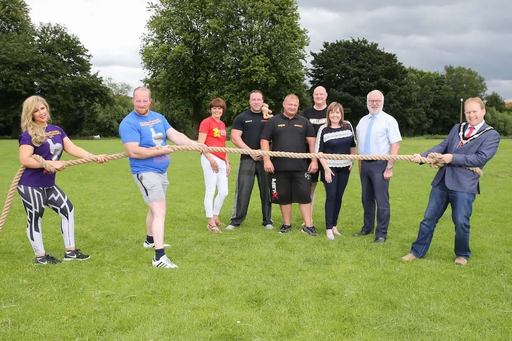 Lord Mayor, Alderman Gareth Wilson, Councillor Julie Flaherty, Simon Truesdale, Event Coordinator, Steven Black, Co-Director Warehouse Gym (Main Sponsor of Event and co event organiser), Strongman, Michael Wilson, Strong Woman, Laura O’Hara, Adrian Farrell, President of Portadown Chamber of Commerce and Owen Matchett, Williams Estate Agents (Sponsor of the event).