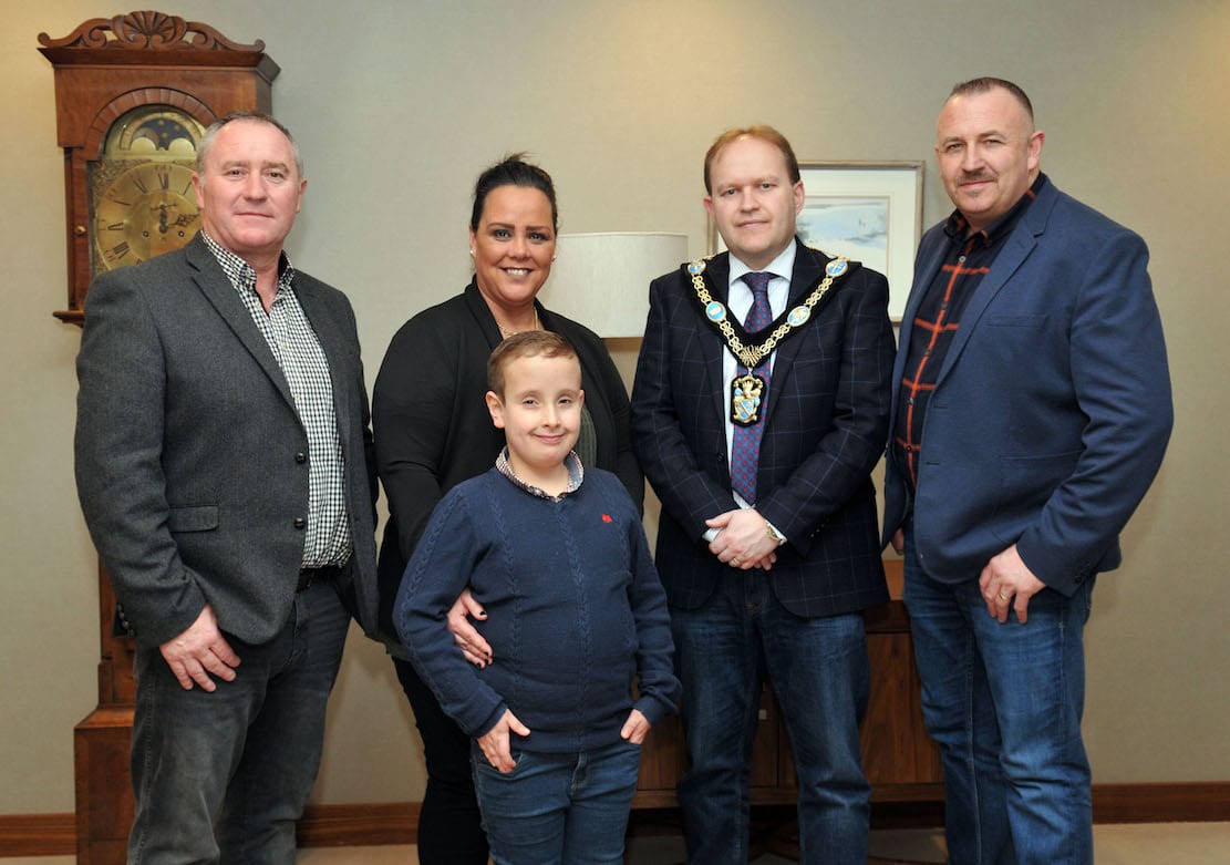 Lord Mayor of Armagh City, Banbridge and Craigavon, Councillor Gareth Wilson and Councillor Declan McAlinden welcome Donna and Stephen Green and son Ryan to Craigavon Civic Centre, to recognise their work for Asthma Awreness, after the death of their eldest son Tiernan last year.