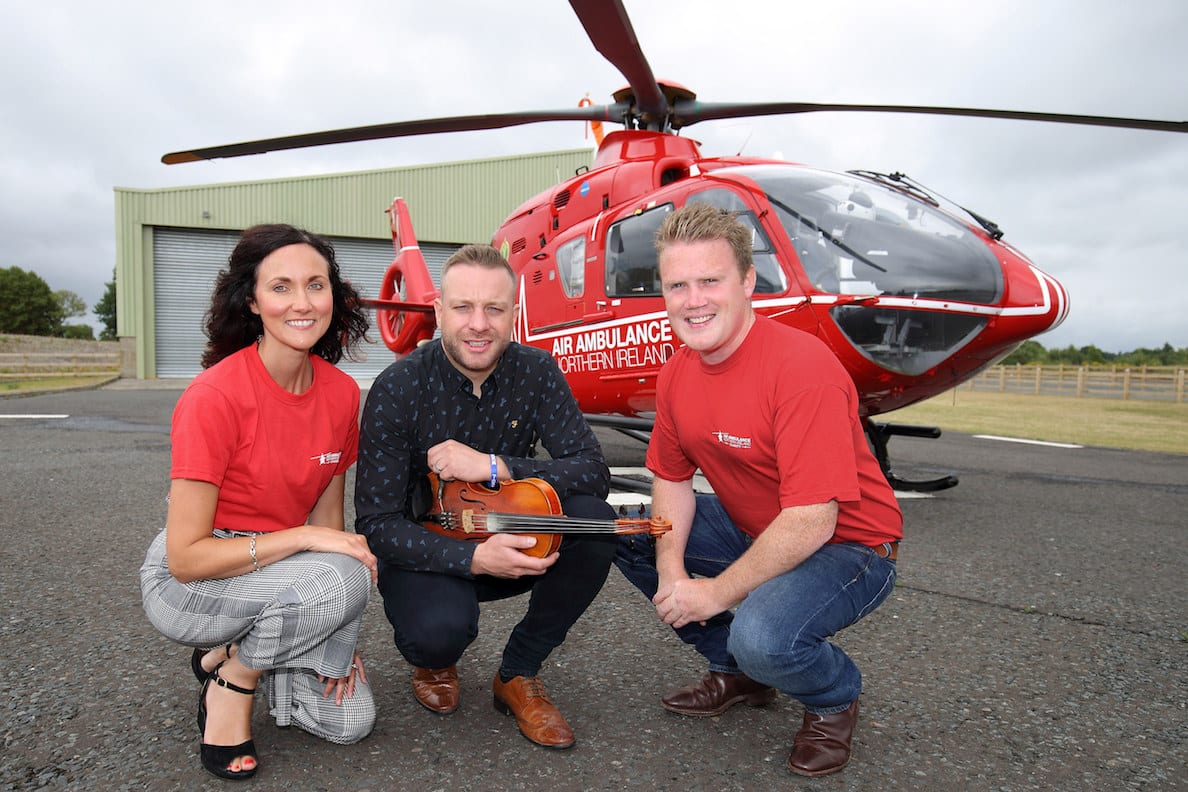 YFCU president James Speers, Ritchie Remo and Kerry Anderson from Air Ambulance. Picture: Cliff Donaldson