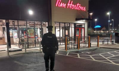 Police officer outside Tim Horton's Portadown