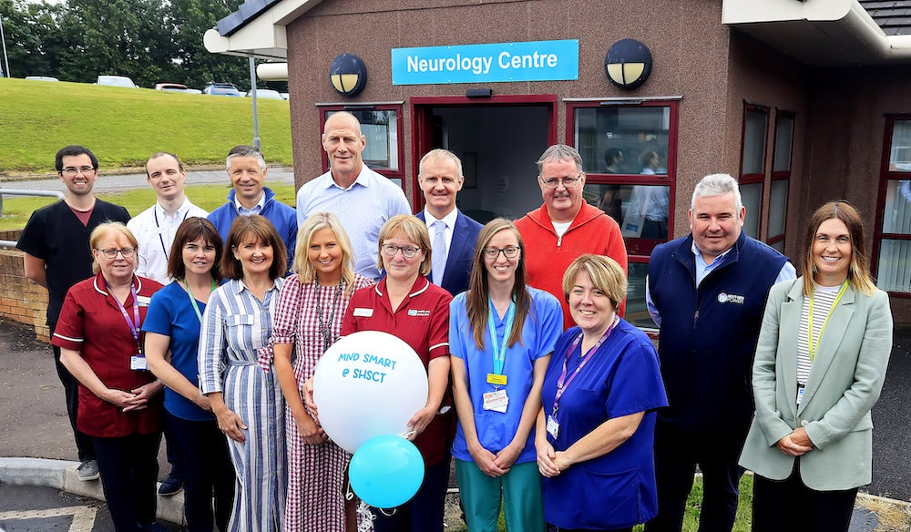 Stuart Thom, Mark Bailey and Paddy Johns, fundraisers from the My Name'5 Doddie Foundation are pictured with Neurology staff who are part of the MND-SMART clinical trial in Craigavon Area Hospital.