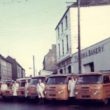 The orange delivery vans of McCann’s Bakery were a familiar sight in Newry, south Armagh and south Down in the 1960s. They are shown here, with the bread servers, in front of the Bakery building before Castle Street was demolished in the late 1960s.