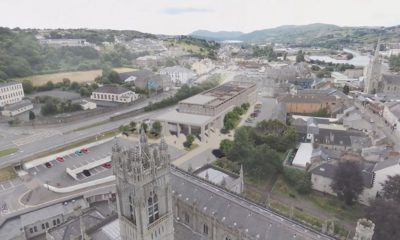 Image of Newry Cathedral and artist's impression of the new NMDDC civic centre.