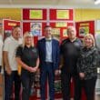 Minister Muir pictured with (L-R) Geoff Ellis, Gordon Neish, Martelle McPartlin, Joe Garvey, Diane Ewart, Kyle Savage, on a recent visit to Richmount Rural Community Association.