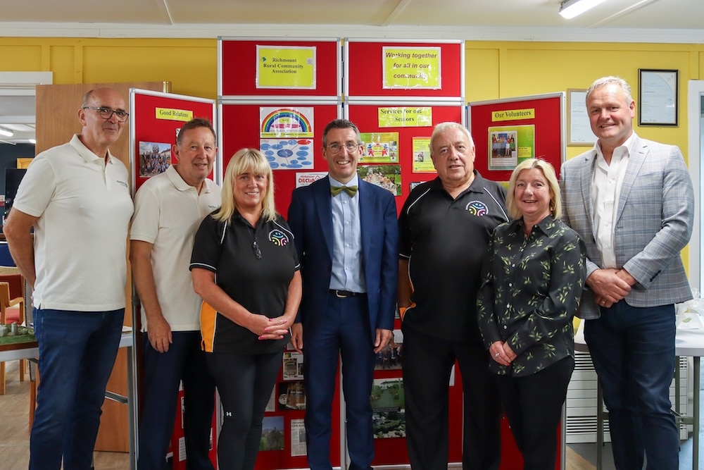 Minister Muir pictured with (L-R) Geoff Ellis, Gordon Neish, Martelle McPartlin, Joe Garvey, Diane Ewart, Kyle Savage, on a recent visit to Richmount Rural Community Association.