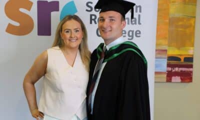 Declan Heaney at graduation alongside fiancée Orla.