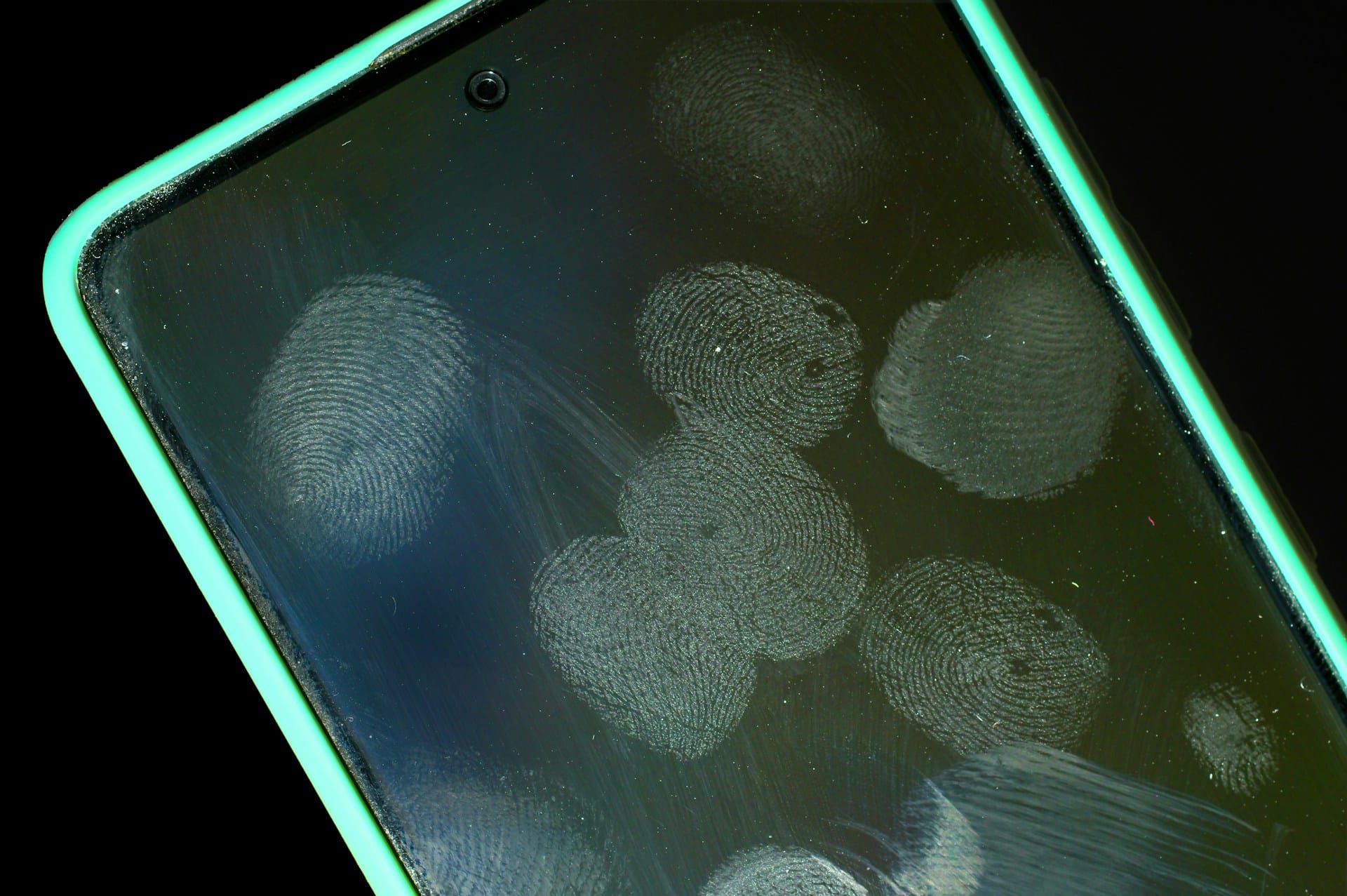 Mobil phone with finger prints visible on the screen